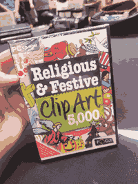 A PC CD-ROM box that reads; Religious & Festive Clip Art 5,000. There are pictures of crosses, angels, reindeer, christmas trees, a man playing a drum, etc.